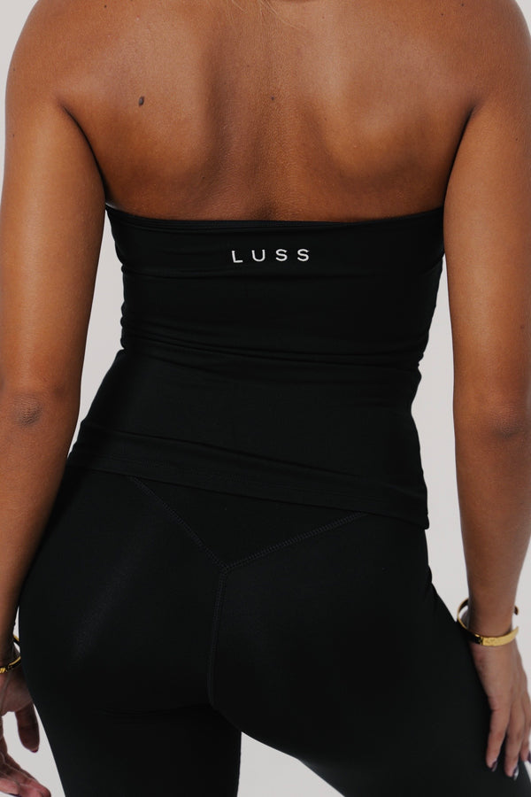 Black sculpting halter crop top — Muse Halter by LUSS Active