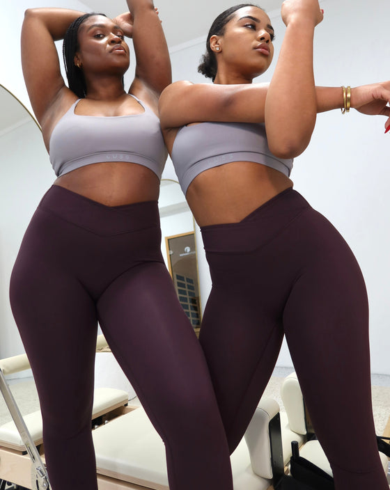 two young female australian athletes wearing non slip custom designed activewear leggings that are the best leggings for working out in australia. they are anti-slip leggings for fitness, and are custom made for running so they will not fall down.
