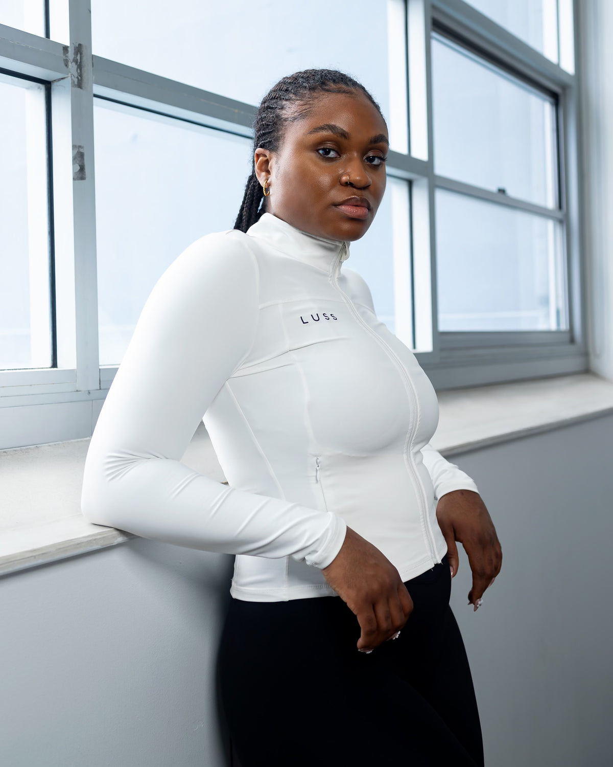 Snow white fitted women's activewear zip-up jacket — LUSS Aura