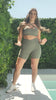 A video of Makayla showing off the front and back details of the Sage Green majestic bra. She has it styled criss cross at the front.