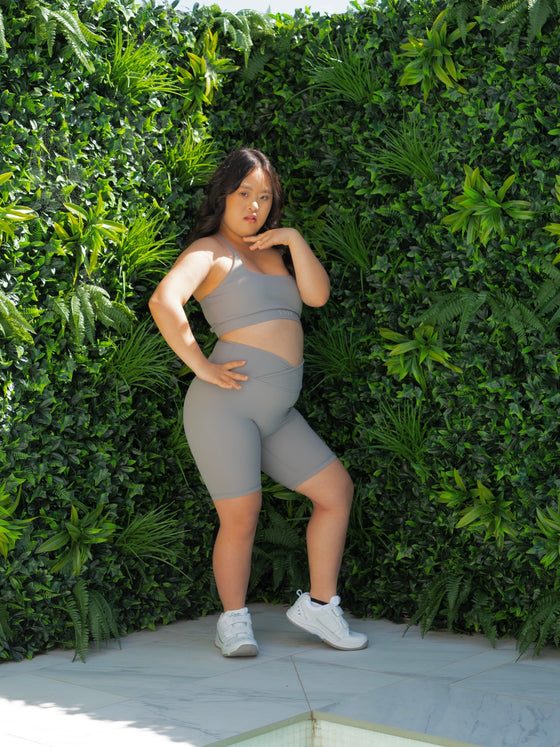 Yena in the Cloud Light Grey Bike Shorts and Majestic bra, styled criss cross at the back.