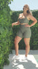 A video of Maddi from photoshoot day showing off the front and back of her Sage Green Majestic bra. Maddi is wearing it criss cross at the back.